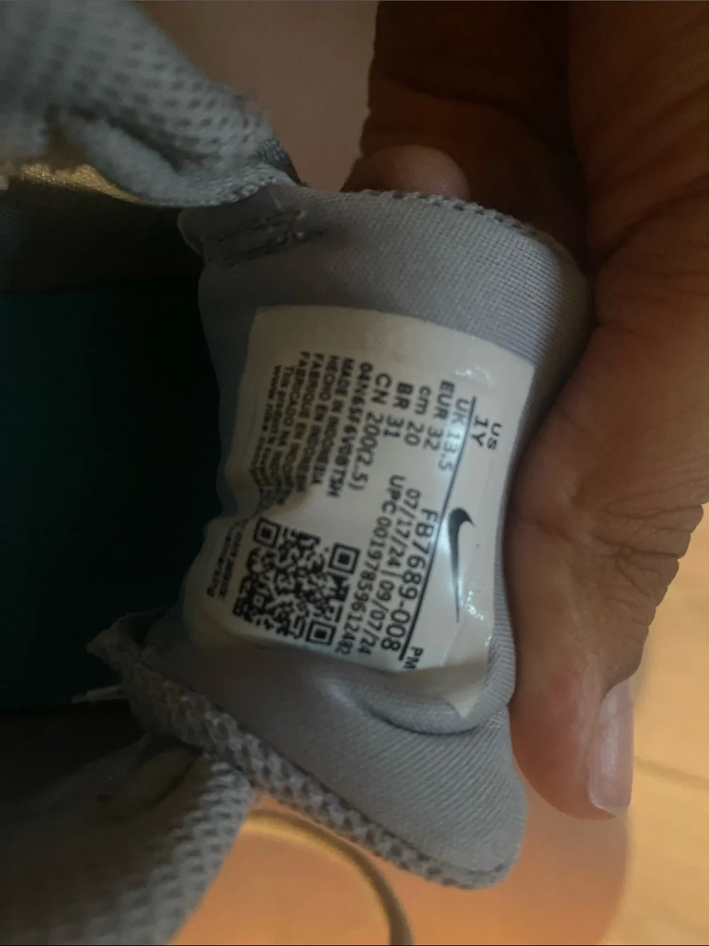 Nike Kids Gray Sneakers with Teal and Coral Accents